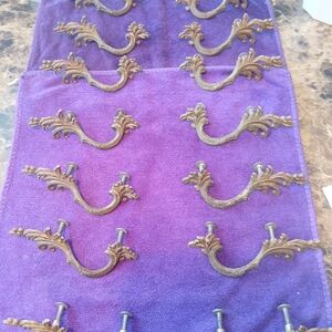 Unique Vintage Ornate Brass Drawer Pulls on Purple Cloth